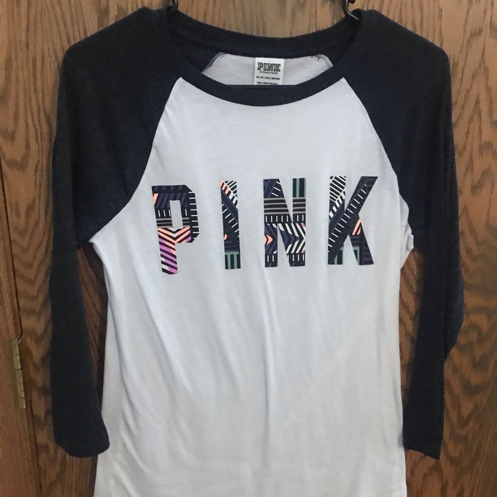 PINK shirt size small. Quarter sleeve.